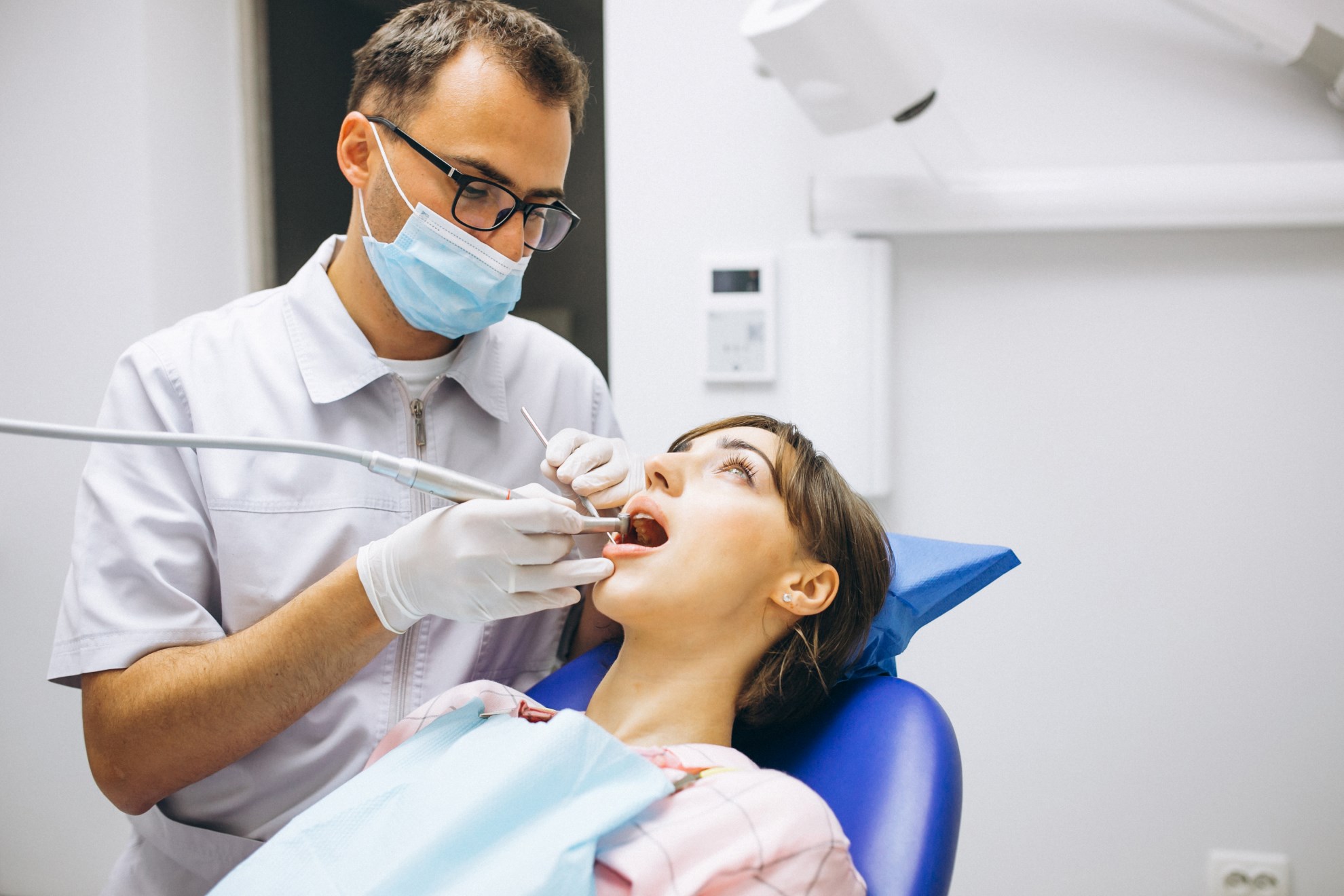 patient taking dental implants treatment